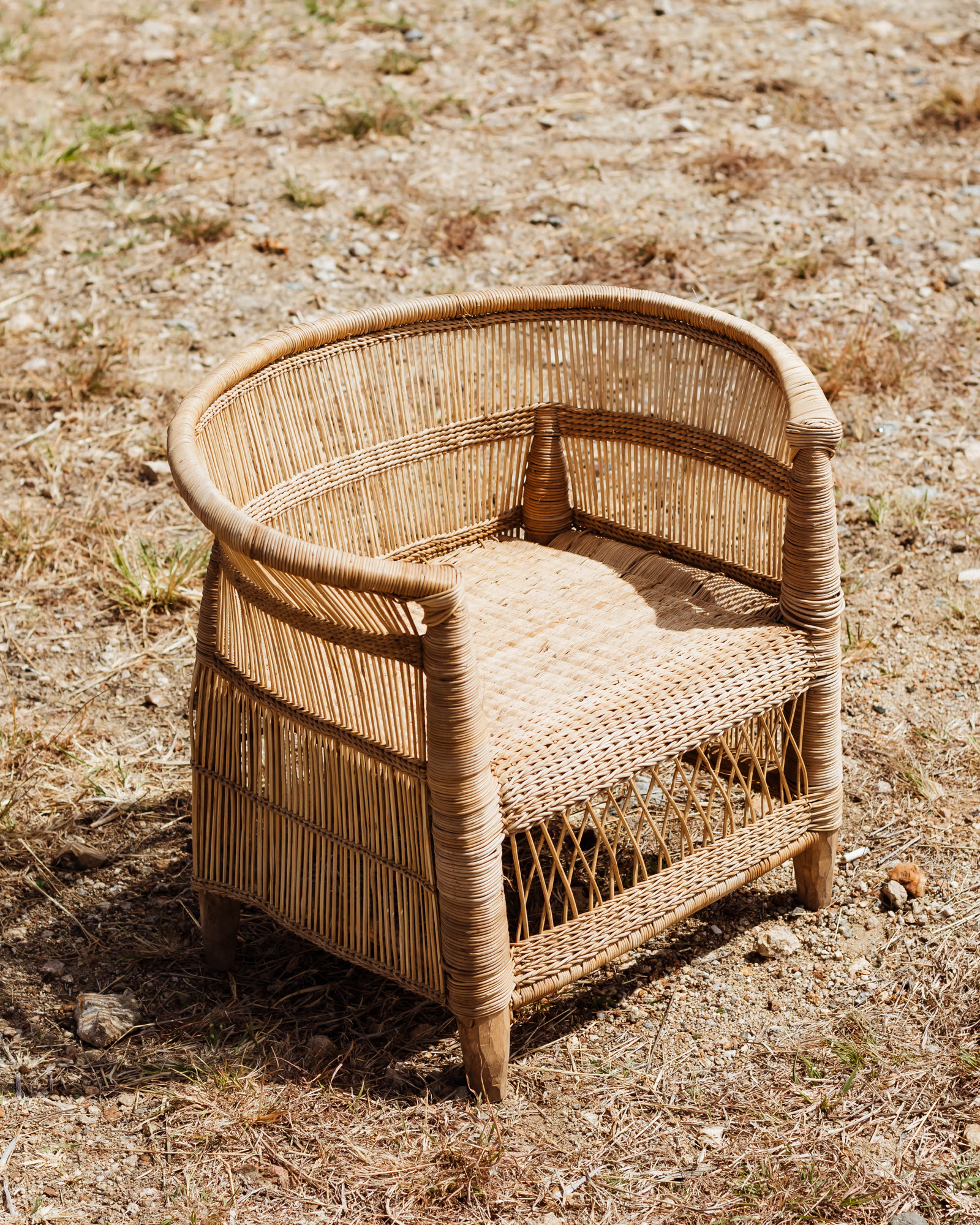 Malawian Chair — handwoven rattan by LOWE Design Studio